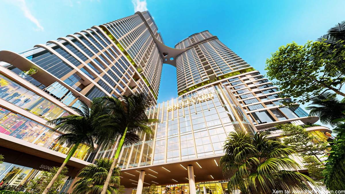 Góc nhìn từ dưới lên của dự án The Emerald Boulevard, thể hiện tòa nhà chính, đường nội khu và cây xanh xung quanh
