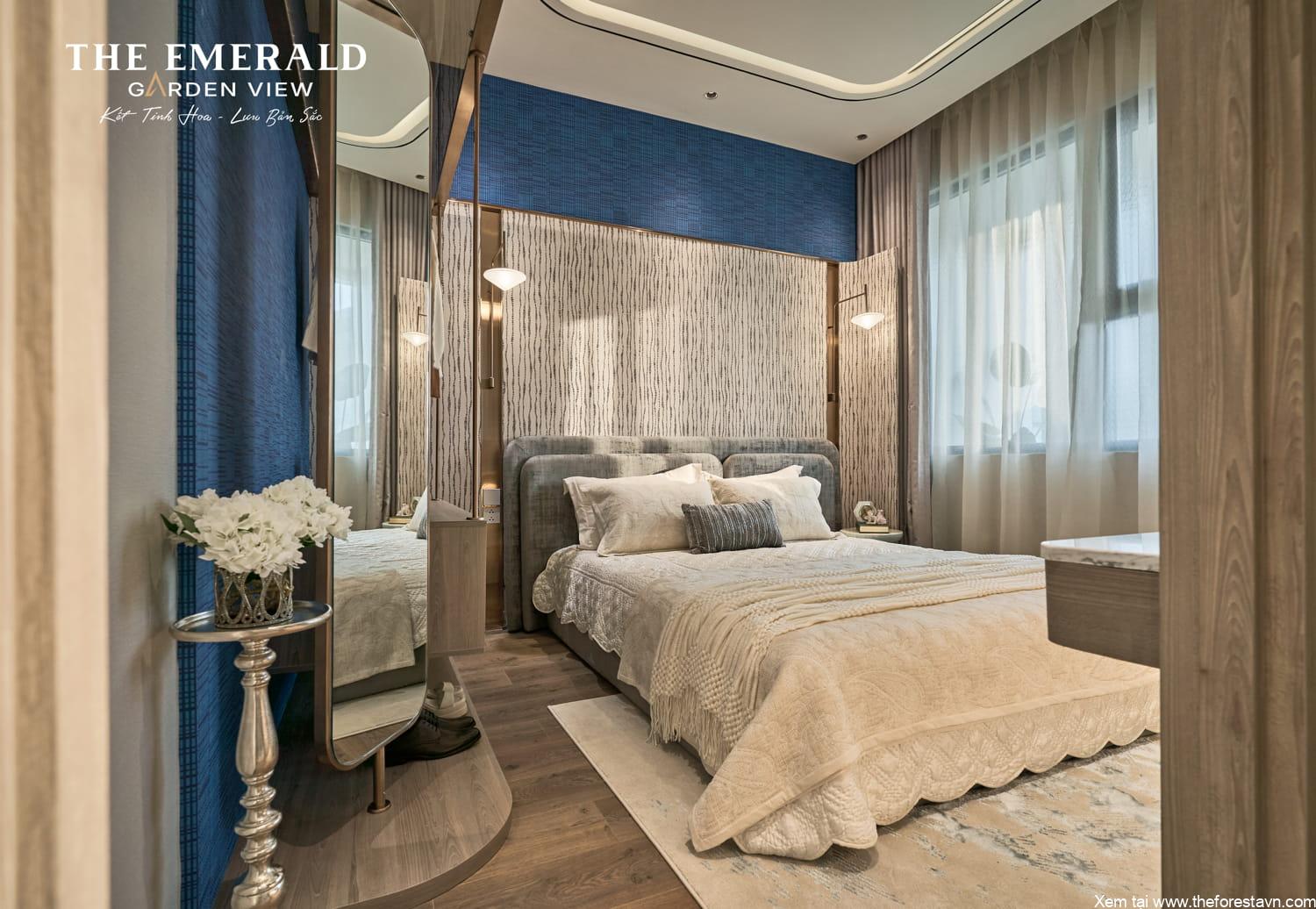 Phòng ngủ căn hộ mẫu 1PN+1 The Emerald Garden có cửa sổ lớn nhìn ra view